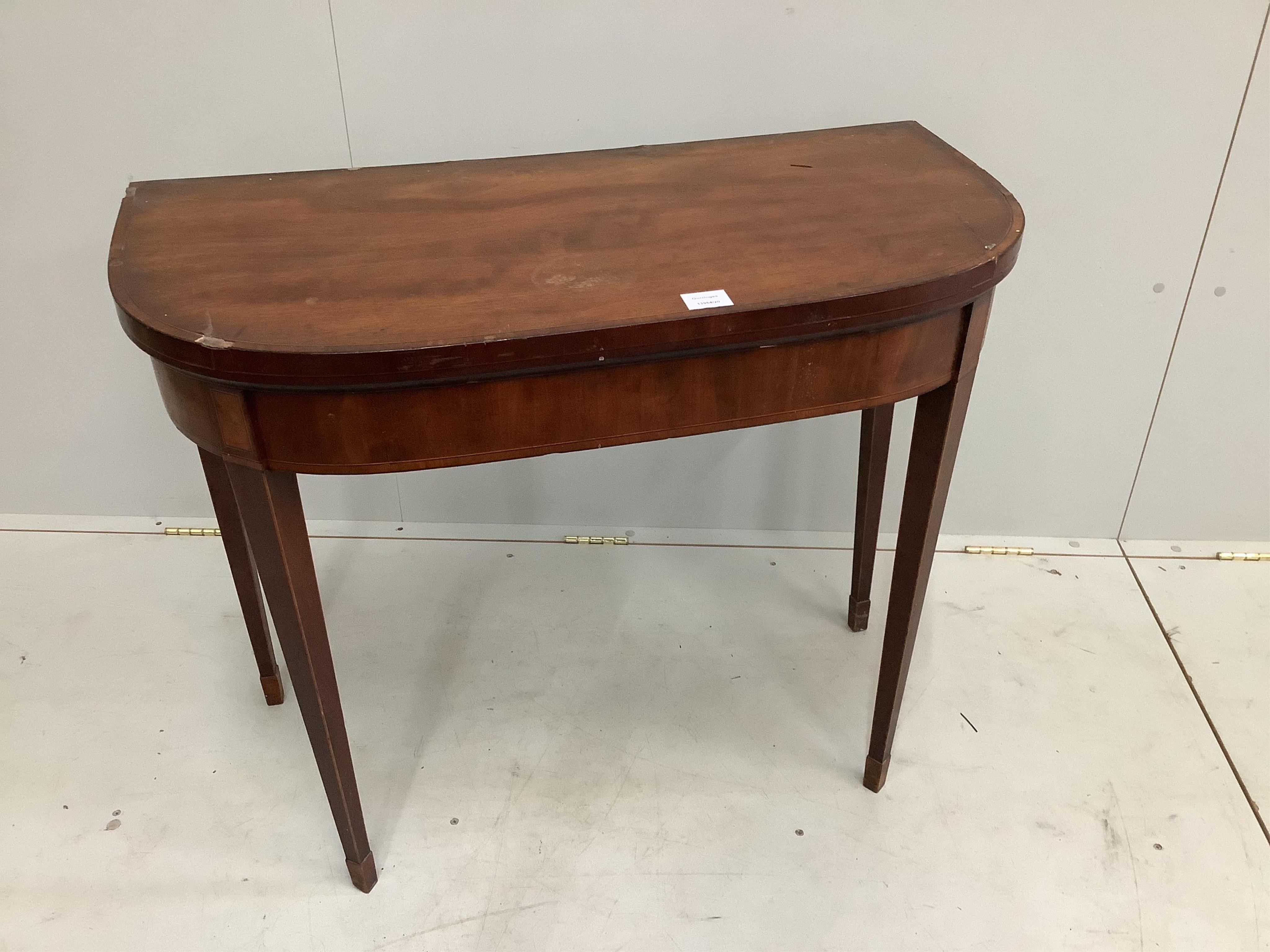 A George III satinwood banded mahogany D shaped folding card table, width 92cm, depth 45cm, height 74cm